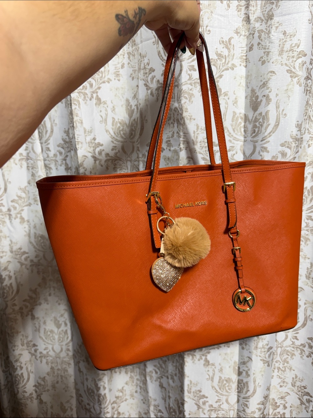 Michael Kors Orange Leather Tote with Pom-Pom Charm